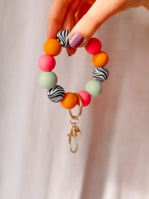 Kralen sleutelhanger: groen/oranje zebra