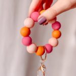 Kralen sleutelhanger: roze/oranje marmer
