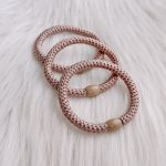 Haarrekker / armbandje beige