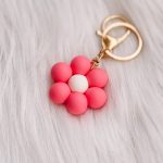 Bloemen sleutelhanger: donkerroze