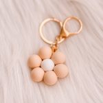 Bloemen sleutelhanger: nude