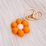 Bloemen sleutelhanger: donkeroranje