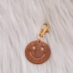 Smiley sleutelhanger brons
