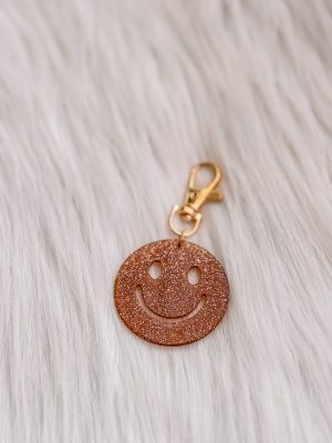 Smiley sleutelhanger brons
