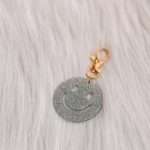 Smiley sleutelhanger zilver