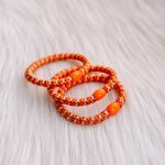 Haarrekker / armbandje oranje strepen