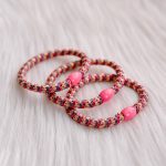 Haarrekker / armbandje paars/roze/goud