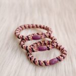Haarrekker / armbandje paars/roze/goud