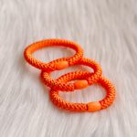 Haarrekker / armbandje oranje