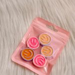 Funky smiley magneten rood/lila