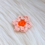 Bloem magneet oranje tinten