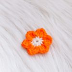 Bloem magneet oranje/wit